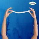Прокладки урологічні жіночі Тена Леді Слім Екстра Плюс (Tena Lady Slim Extra Plus) 16 шт — Фото 19