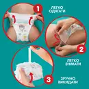 Подгузники-трусики для детей Памперс Пантс (Pampers Pants) размер 4 (9-15 кг) 52 шт — Фото 16