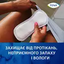 Прокладки урологічні жіночі Тена Леді Слім Міні Плюс (Tena Lady Slim Mini Plus) 16 шт — Фото 14