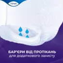 Підгузники-труси для дорослих Тена Пантс Плюс Найт Екстра Лардж (Tena Pants+ Night Extra Large) розмір 4 10 шт — Фото 13