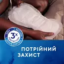 Прокладки урологічні жіночі Тена Леді Максі Найт (Tena Lady Mахі Night) 12 шт — Фото 17