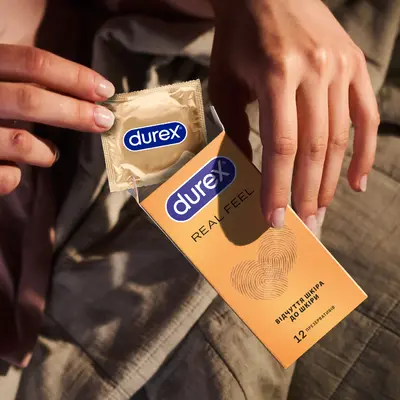 Презервативи Дюрекс (Durex Real Feel) з синтетичного латексу з силіконовою змазкою природні відчуття 12 шт — Фото 6